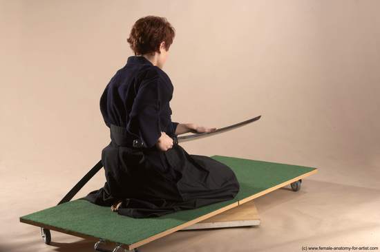 Sportswear Fighting with sword Woman White Sitting poses - ALL Slim short red Sitting poses - on knees Academic