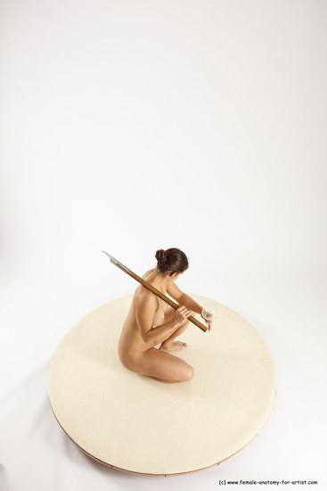 Nude Woman White Kneeling poses - ALL Athletic Kneeling poses - on one knee long brown Fighting with axe Multi angle poses Pinup