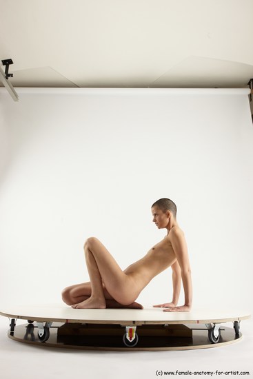 Nude Woman White Sitting poses - ALL Slim bald Sitting poses - on knees Multi angle poses Pinup