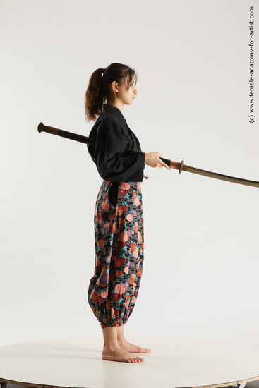 Sportswear Fighting with sword Woman Asian Slim long black Multi angle poses Academic