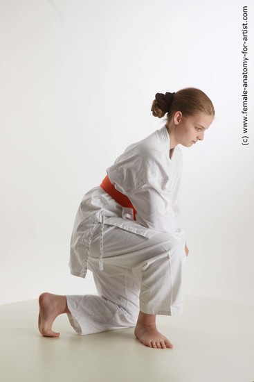 Sportswear Woman White Kneeling poses - ALL Slim Kneeling poses - on one knee long brown Standard Photoshoot  Academic