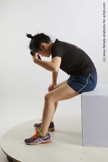 Sportswear Fighting with gun Woman Asian Sitting poses - ALL Average medium black Sitting poses - simple Standard Photoshoot Academic