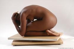 Nude Woman White Sitting poses - ALL Slim dreadlocks black Sitting poses - simple Pinup