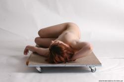 Nude Woman White Laying poses - ALL Slim Laying poses - on back medium colored Pinup