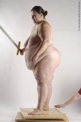 Nude Fighting with sword Woman White Standing poses - ALL Overweight medium brown Standing poses - simple Pinup