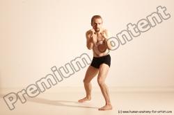 Underwear Martial art White Moving poses Slim short blond Dynamic poses