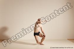 Underwear Gymnastic poses White Moving poses Slim bald Dynamic poses