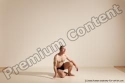 Underwear Gymnastic poses White Moving poses Slim bald Dynamic poses