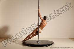 Poledance reference poses of Mercedes